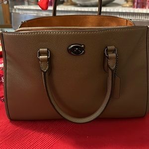 Coach handbag I only use the bag maybe once or twice looks like brand new